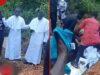 disbelief as priest falls into grave during burial ceremony priest falls into grave yard