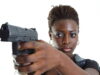 Parent shows gun to teacher for disciplining child.