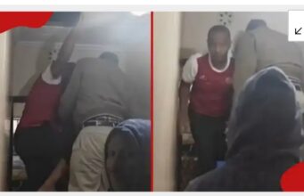 Photos of senior county official hiding in ceiling during arrest