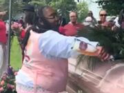 Drama as woman pours expensive alcohol to a coffin during burial