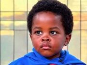 Young boy with computer in head and can perform complex mathematical problems